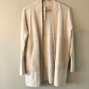 Sit in lotus wrap Lululemon merino will sweater